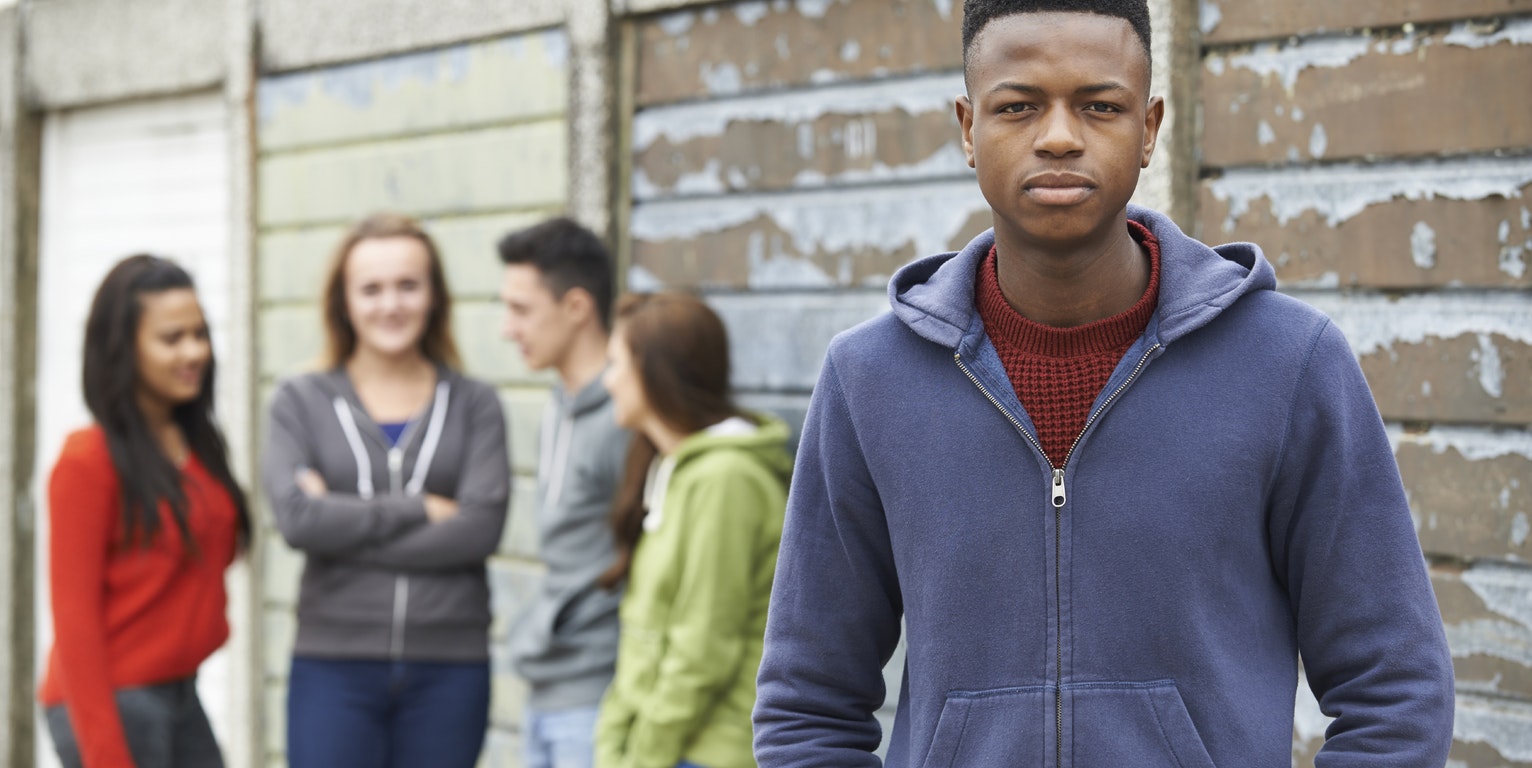 Boy excluded from group of friends image