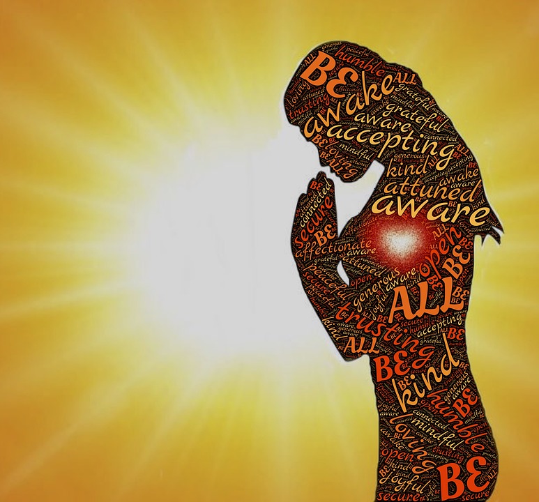 Silhouette of a woman meditating mindfulness