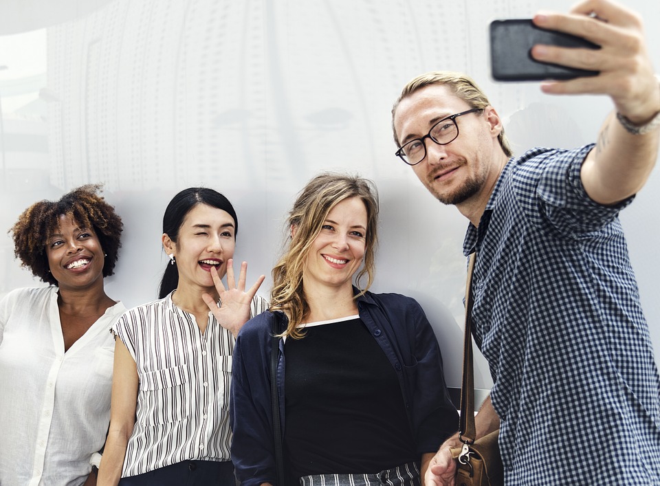 group of friends taking a picture image