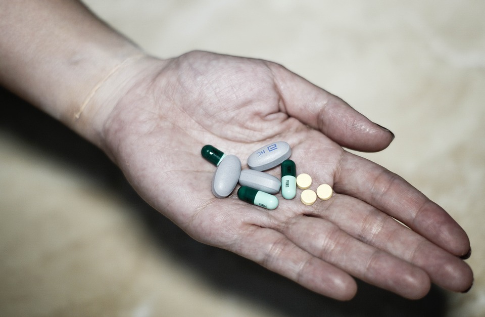 Handful of Pills Image
