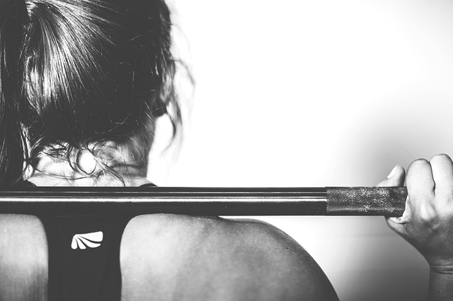 Woman Lifting Weight Image
