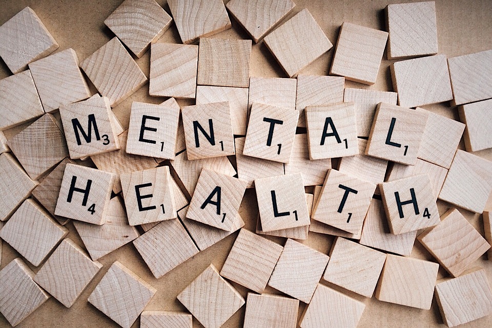 "Mental Health" spelled in scrabble tiles image