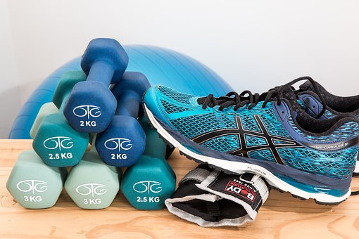 Hand Weights and Running Shoes Image