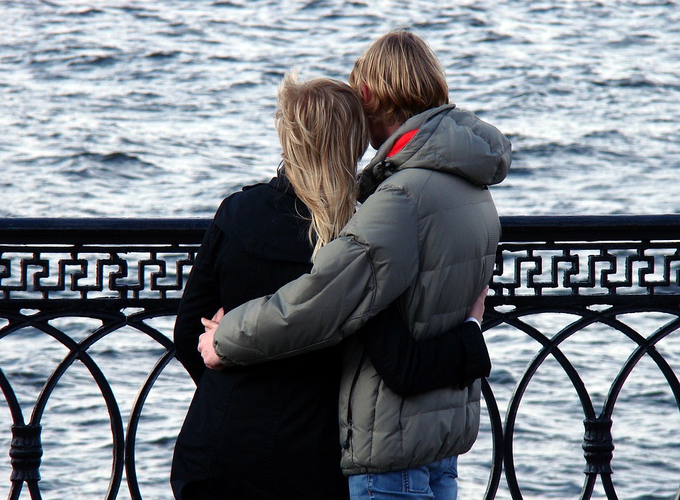 couple with arms around eachother